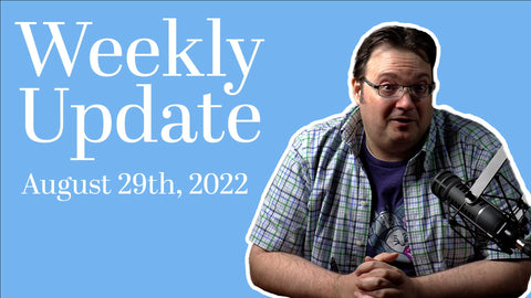 Brandon Sanderson sitting near a mic, recording the Weekly Update for August 29 2022